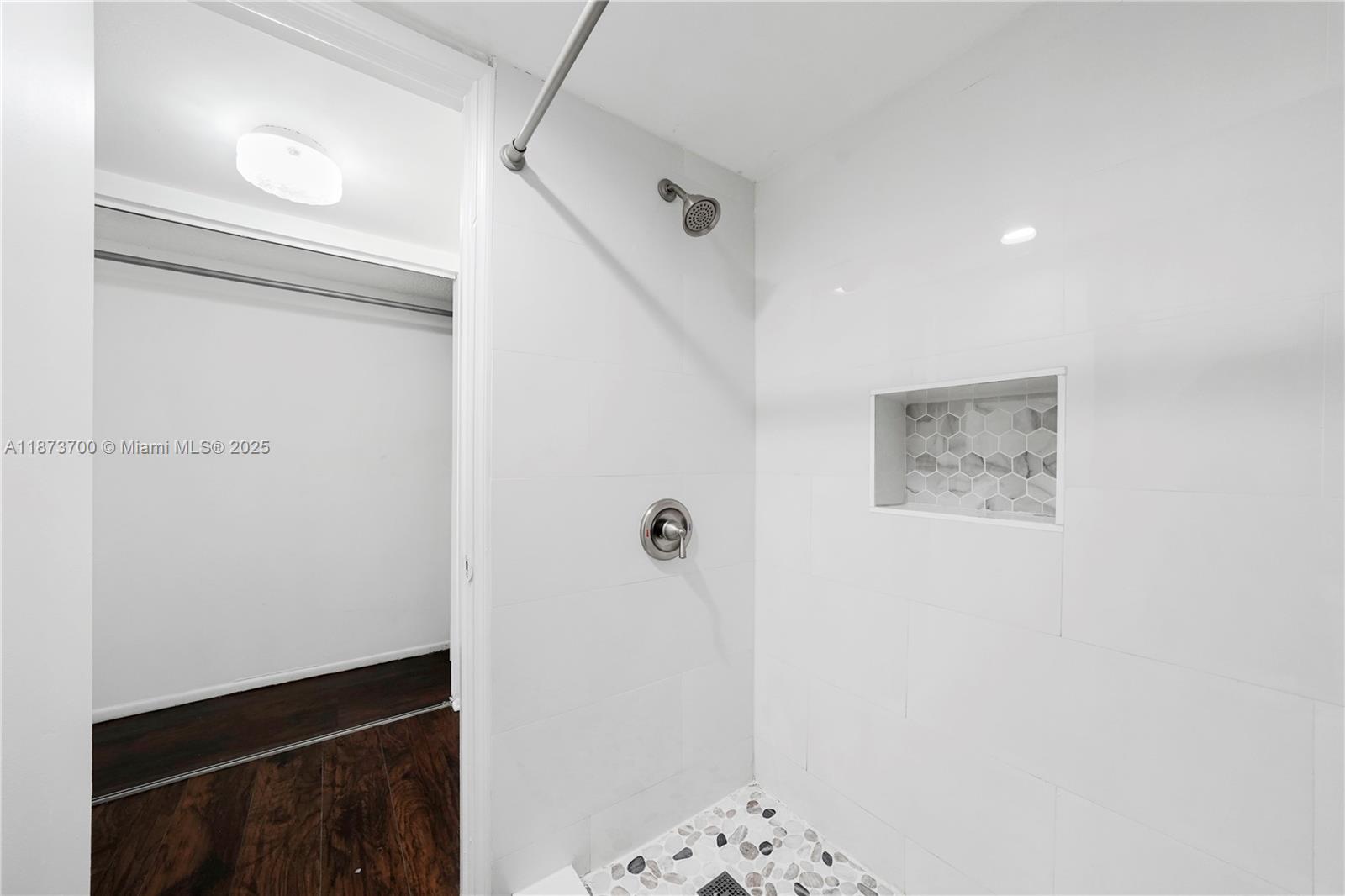 9491 Evergreen Place, Unit 207 Davie, FL 33324 - Photo 22 of 42 a bathroom with a shower