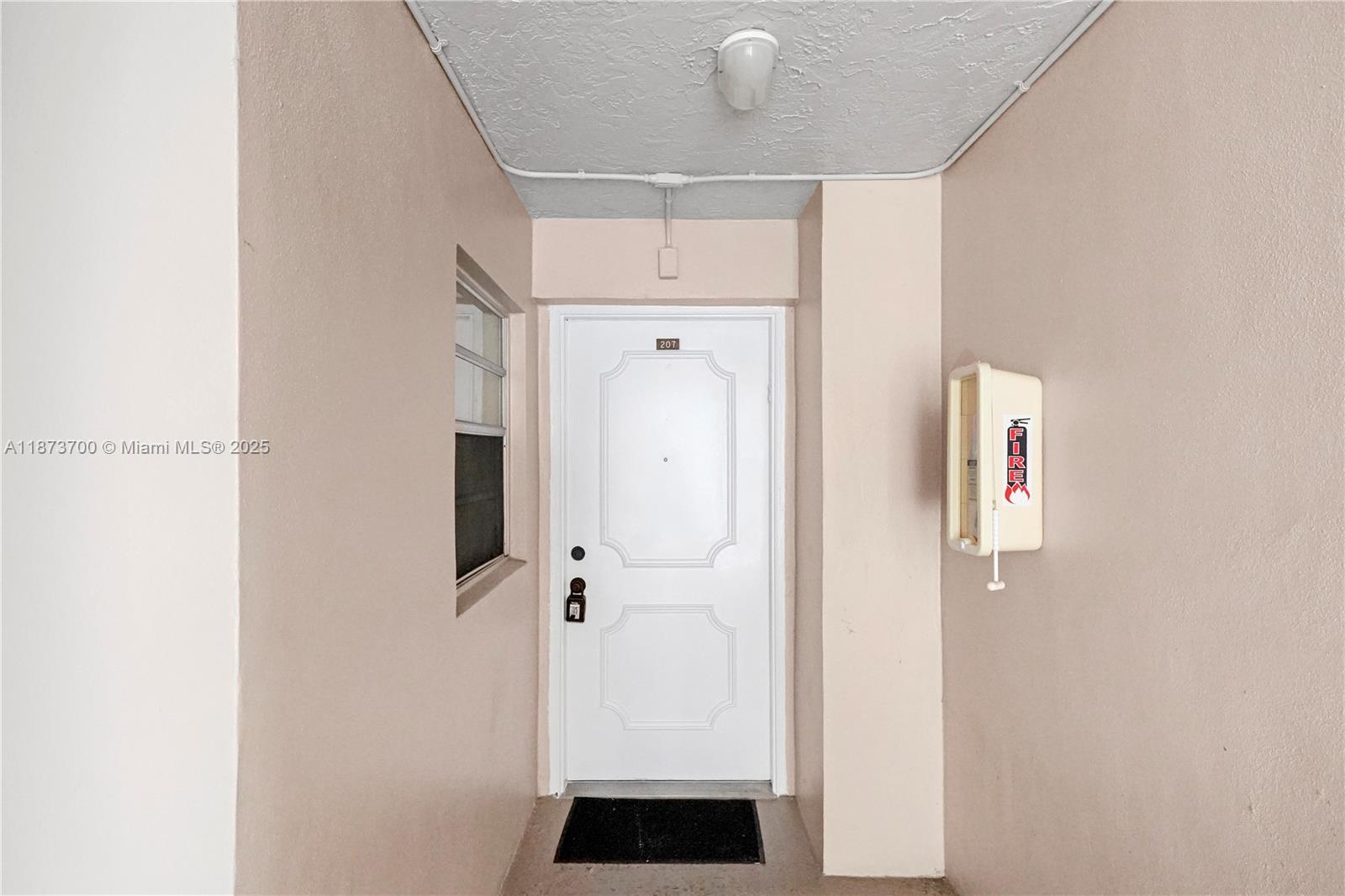 9491 Evergreen Place, Unit 207 Davie, FL 33324 - Photo 24 of 42 a bathroom with a shower and mirror