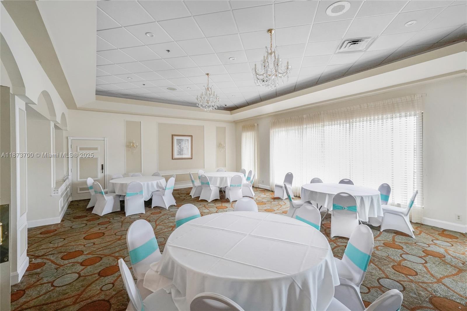 9491 Evergreen Place, Unit 207 Davie, FL 33324 - Photo 31 of 42 a living room with lots of furniture and wooden floor
