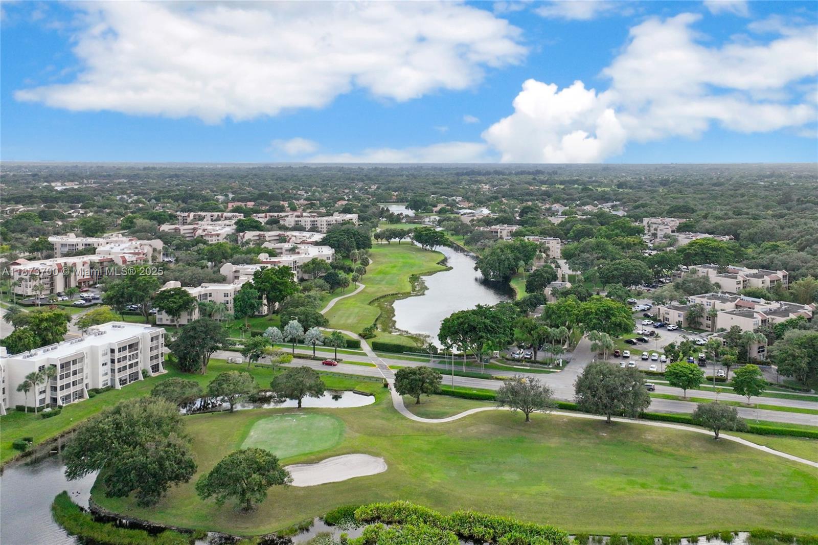 9491 Evergreen Place, Unit 207 Davie, FL 33324 - Photo 37 of 42 an aerial view of residential houses with outdoor space and lake view