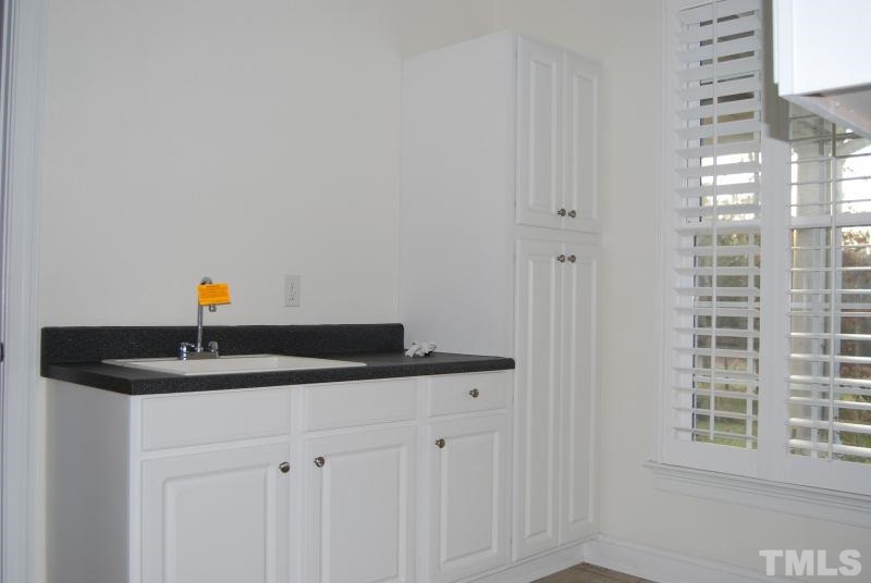 10312 Rougemont Road Bahama, NC 27503 - Photo 8 of 19 a bathroom with a sink and a mirror