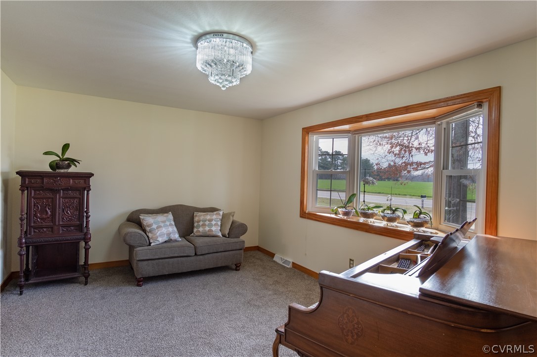 7466 Studley Road Mechanicsville, VA 23116 - Photo 16 of 34 a room with furniture and a window
