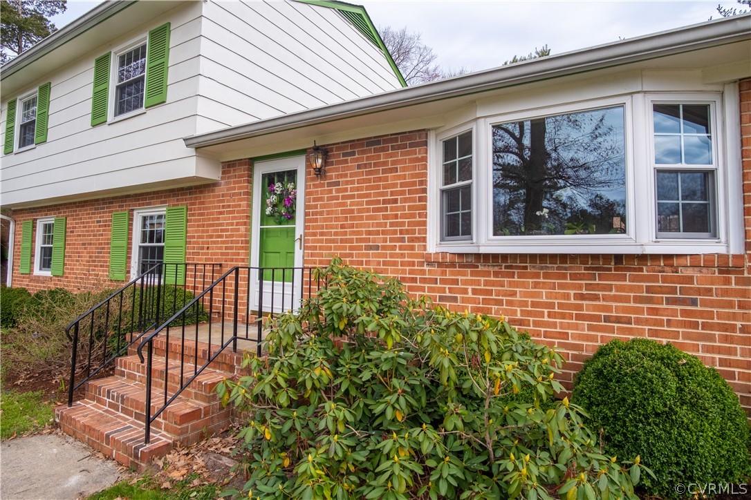 7466 Studley Road Mechanicsville, VA 23116 - Photo 2 of 34 a view of a house with a small yard and wooden floor and fence