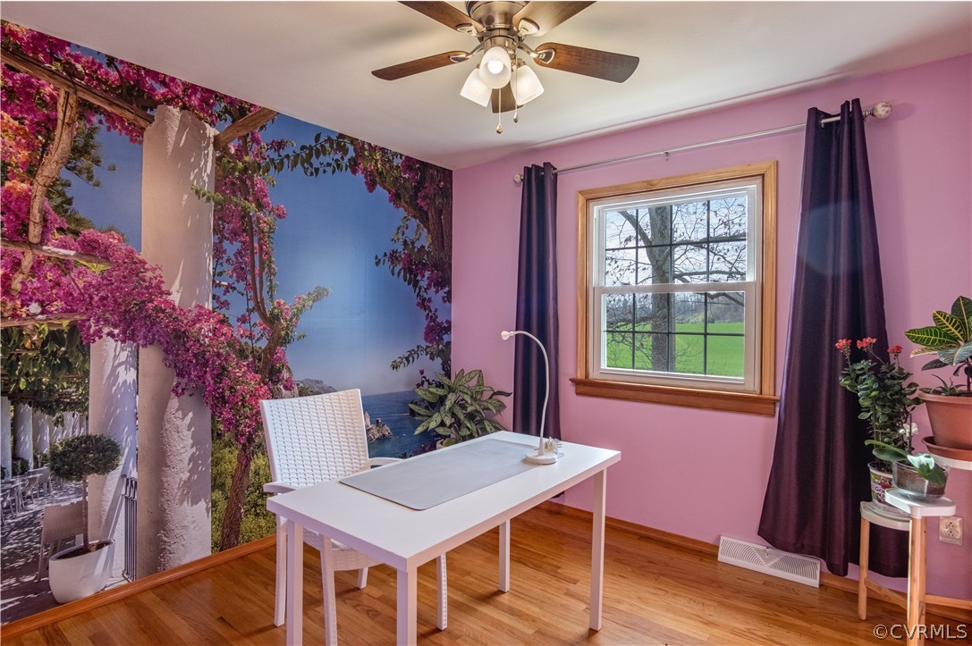 7466 Studley Road Mechanicsville, VA 23116 - Photo 28 of 34 a view of a dining room with furniture and window