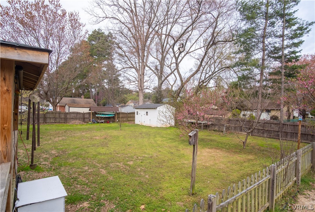 7466 Studley Road Mechanicsville, VA 23116 - Photo 8 of 34 a swimming pool with some trees