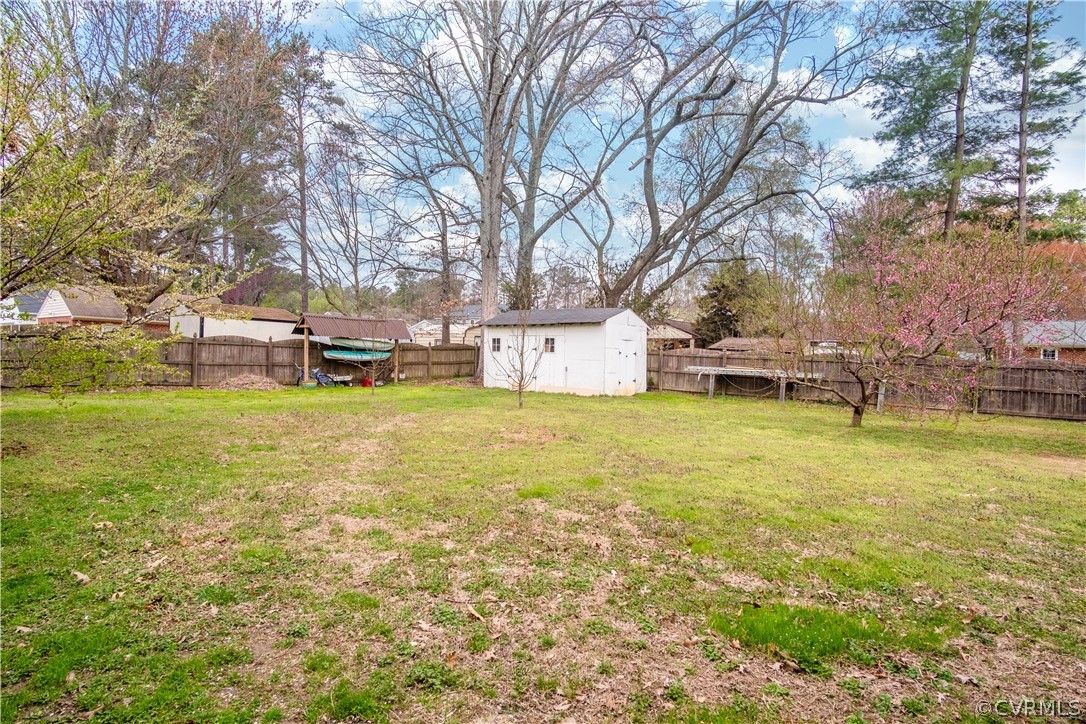 7466 Studley Road Mechanicsville, VA 23116 - Photo 10 of 34 a view of a house with yard and sitting area