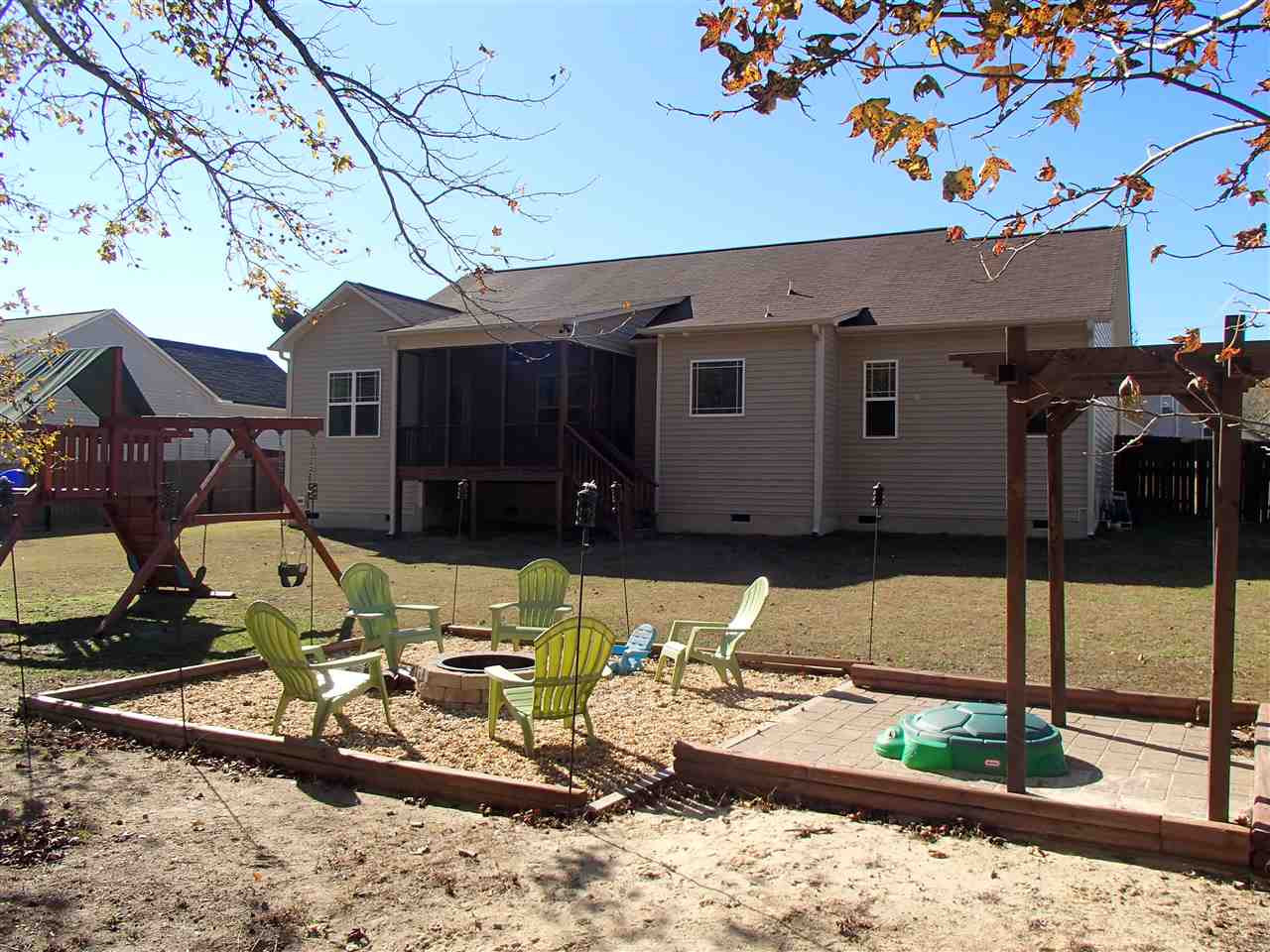 2183 Matthews Road Clayton, NC 27520 - Photo 7 of 25 The back yard has a playground, fire pit area and more! Enjoy a relaxing evening in the privacy of your own back yard. yard