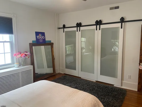 a view of a hallway with washer and dryer