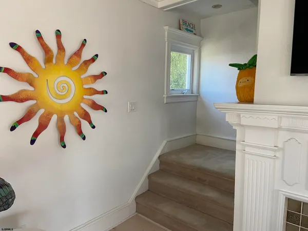 a bedroom with bed and window