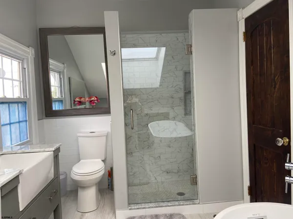 a view of deck with wooden floor and a yard