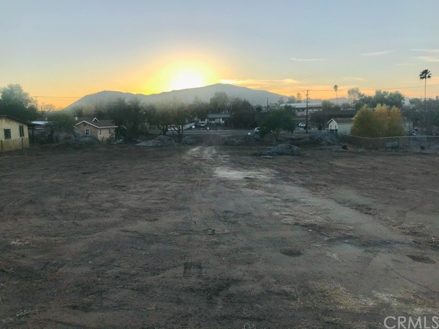 21420 Old Elsinore Road Perris, CA 92570 - Photo 1 of 1 a view of a mountain in the distance in a field