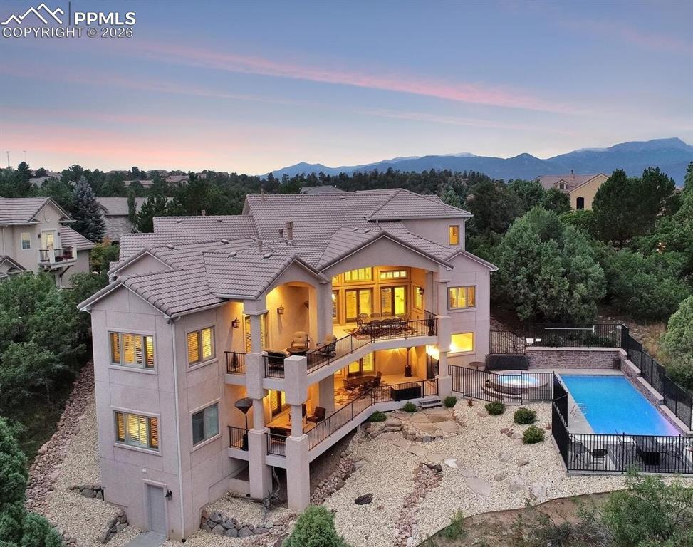 5039 Stonehill Road Colorado Springs, CO 80918 - Photo 3 of 50 an aerial view of a house with a big yard