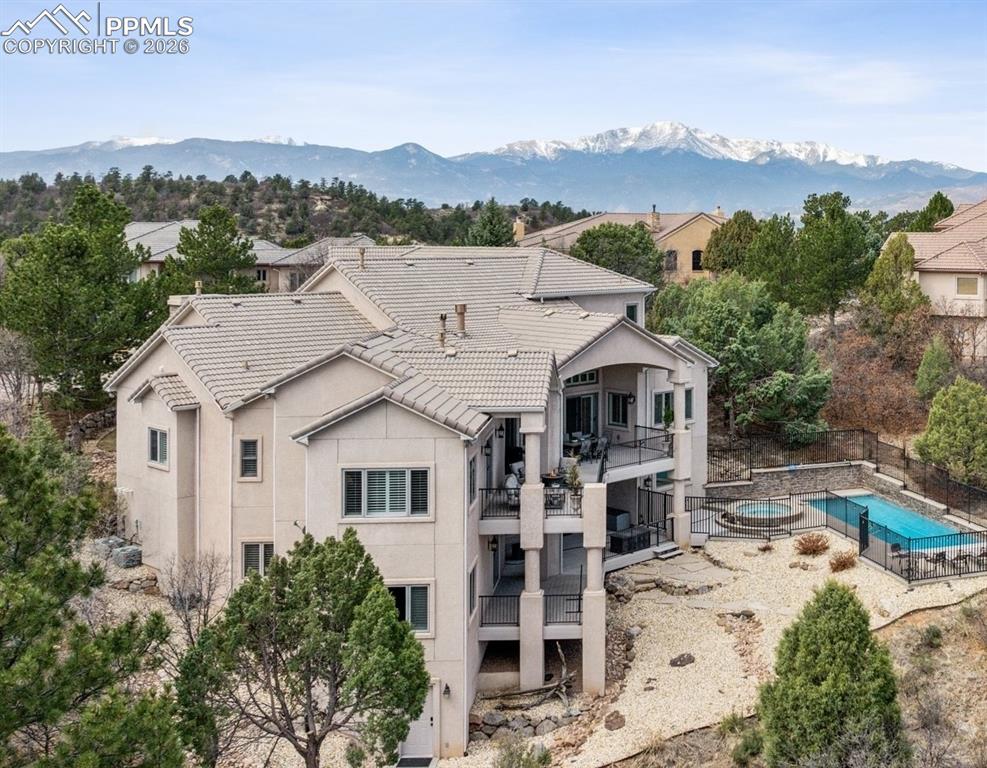 5039 Stonehill Road Colorado Springs, CO 80918 - Photo 5 of 50 an aerial view of a house with a yard