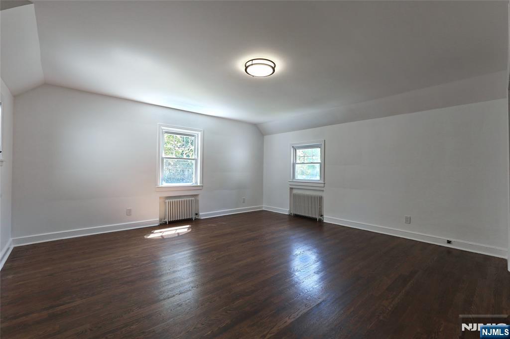 55 Forest Road Demarest, NJ 07627 - Photo 15 of 27 an empty room with wooden floor and windows
