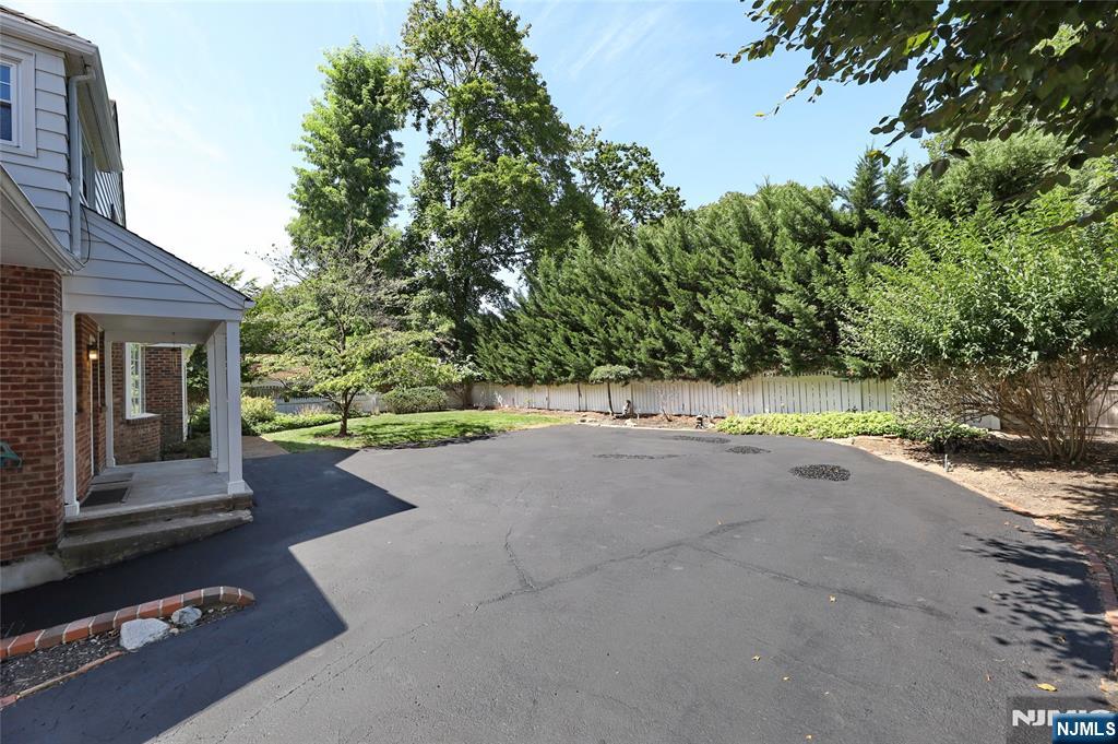 55 Forest Road Demarest, NJ 07627 - Photo 26 of 27 a view of a house with a yard