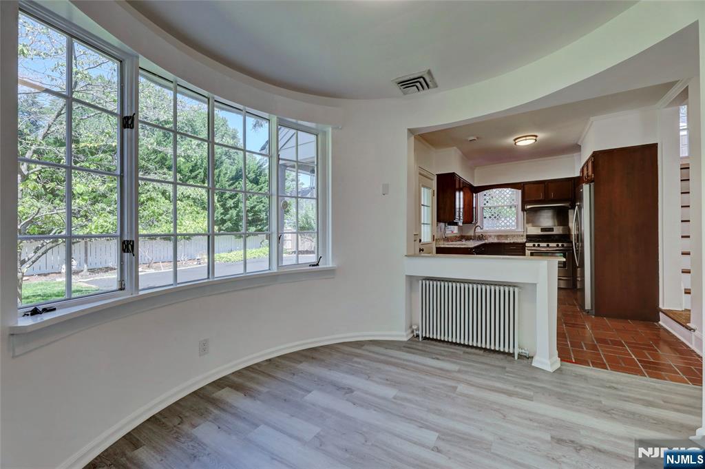 55 Forest Road Demarest, NJ 07627 - Photo 10 of 27 an empty room with wooden floor and windows