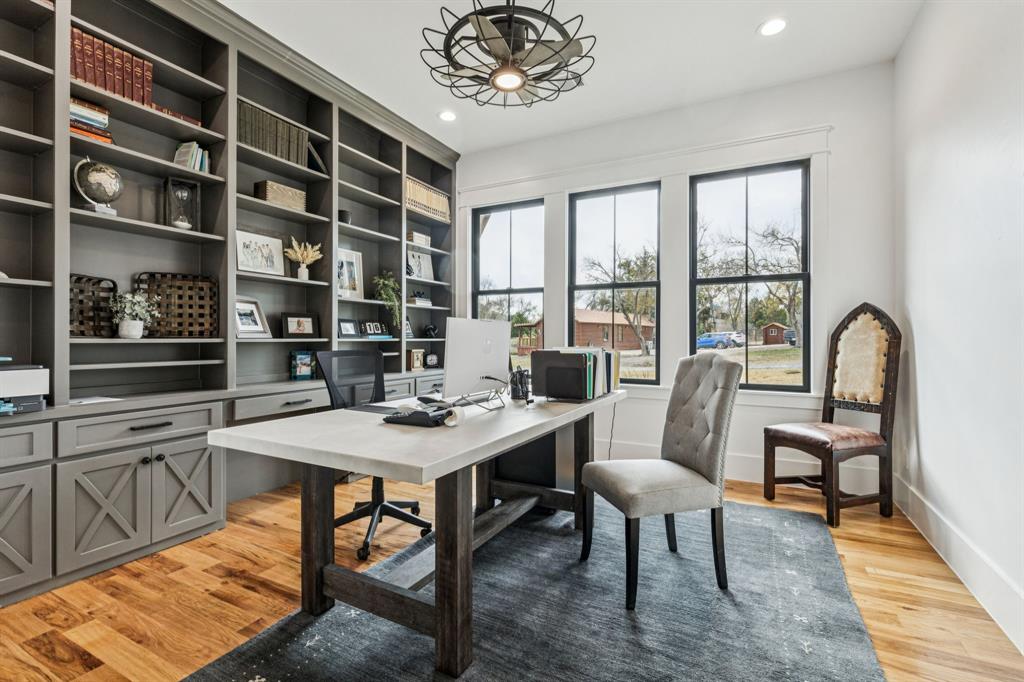 2577 Lone Star Road, Unit 1 Celina, TX 75009 - Photo 12 of 40 a view of a dining room with furniture window and wooden floor
