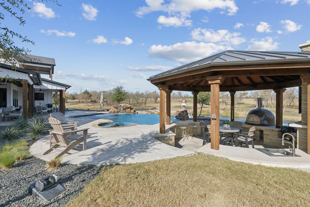 2577 Lone Star Road, Unit 1 Celina, TX 75009 - Photo 20 of 40 a view of a roof deck with sitting area