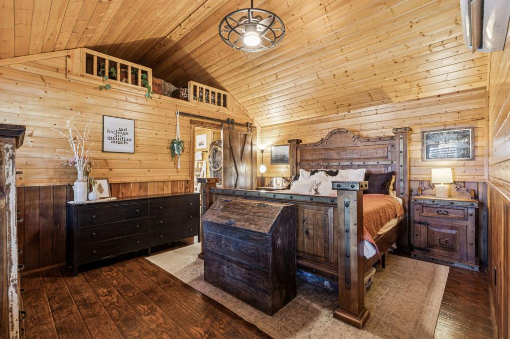 2577 Lone Star Road, Unit 1 Celina, TX 75009 - Photo 26 of 40 a bed room with furniture and a window