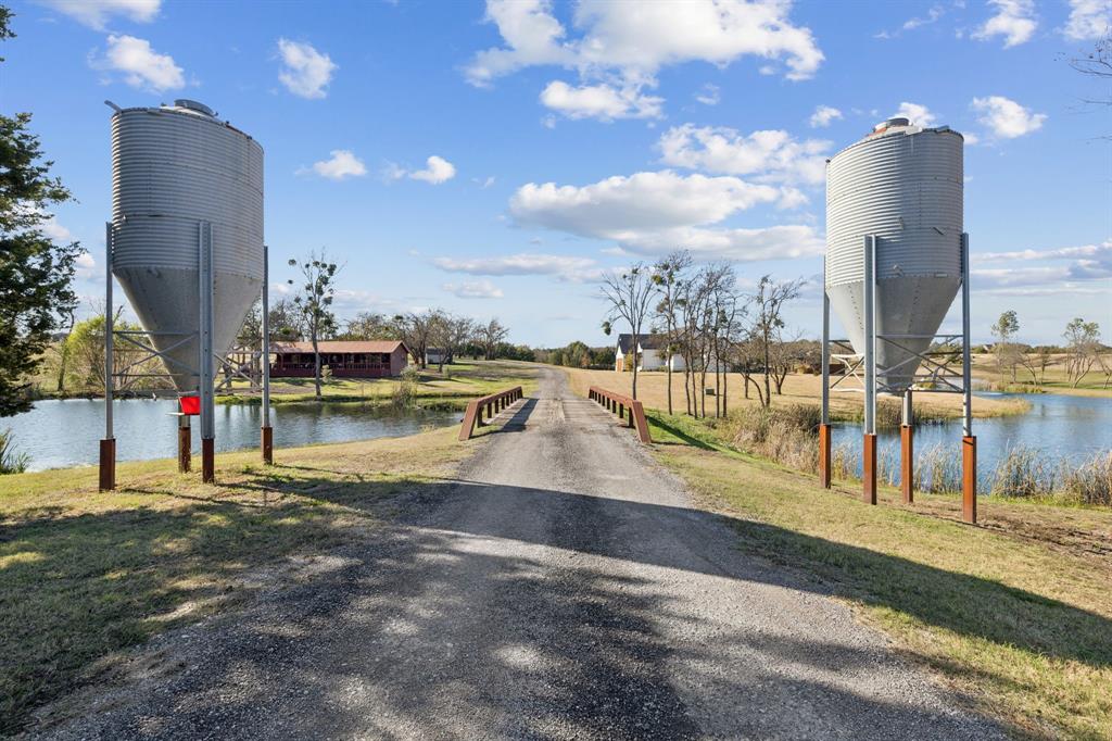 2577 Lone Star Road, Unit 1 Celina, TX 75009 - Photo 39 of 40 a view of a swimming pool with an outdoor seating