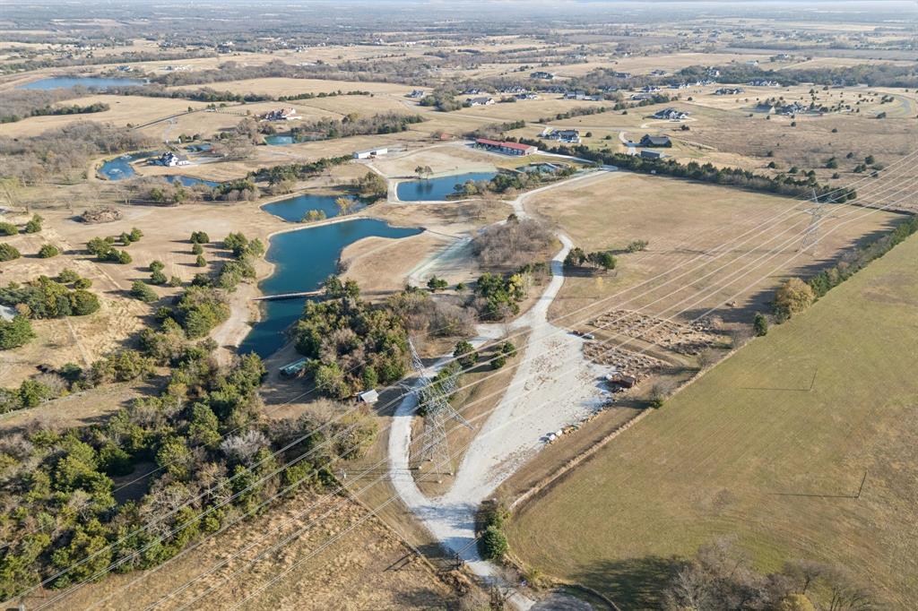 2577 Lone Star Road, Unit 1 Celina, TX 75009 - Photo 40 of 40 an aerial view of residential houses with outdoor space