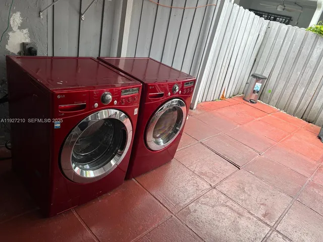 a view of outdoor space with wooden floor