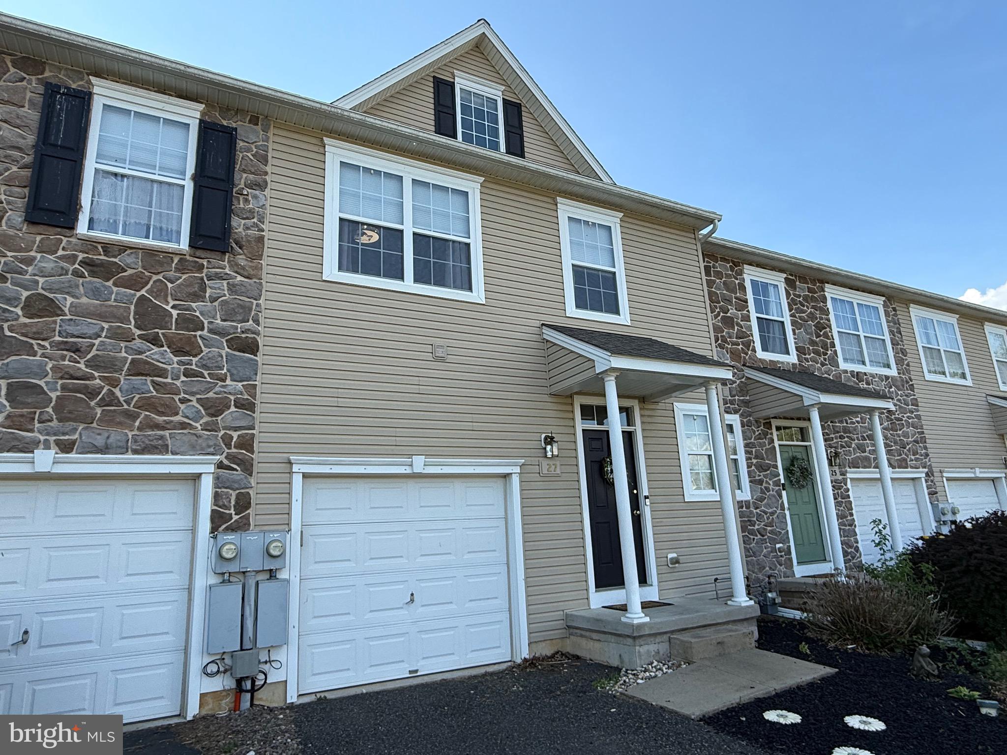 27 Bishop Pine Road Barto, PA 19504 - Photo 1 of 20 a front view of a house with a garage