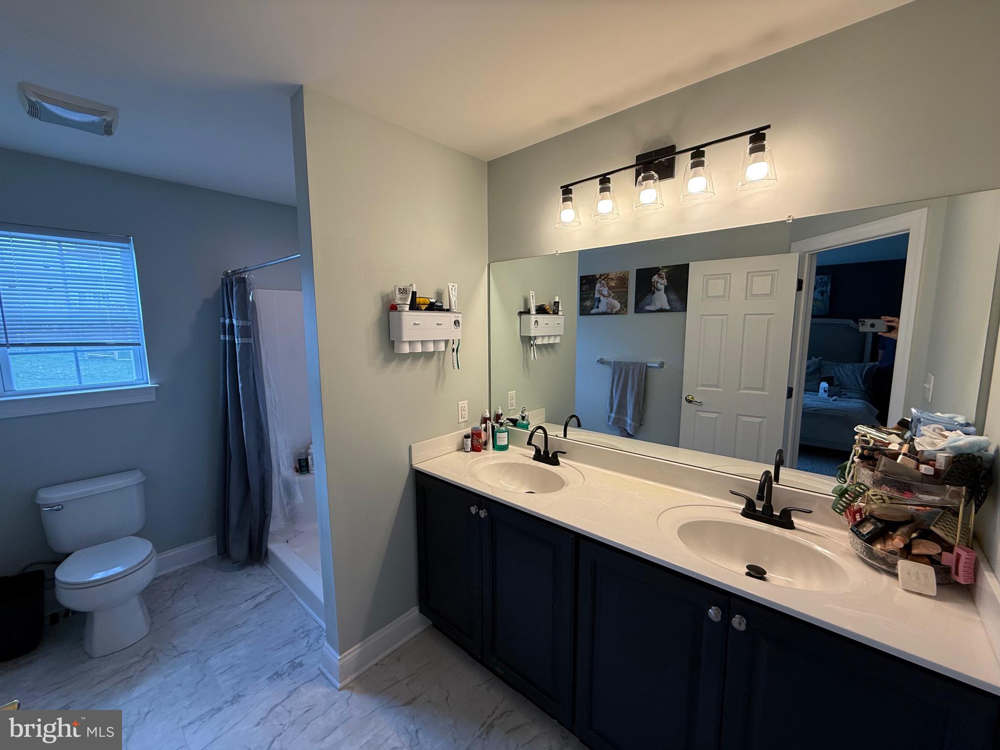 27 Bishop Pine Road Barto, PA 19504 - Photo 13 of 20 a bathroom with a sink double vanity and a toilet