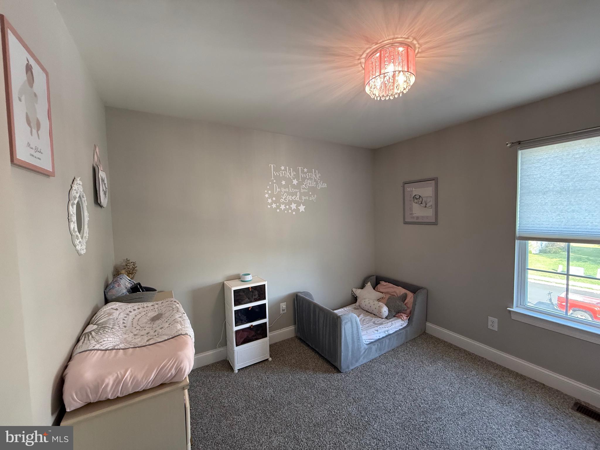 27 Bishop Pine Road Barto, PA 19504 - Photo 17 of 20 a living room with furniture and a chandelier