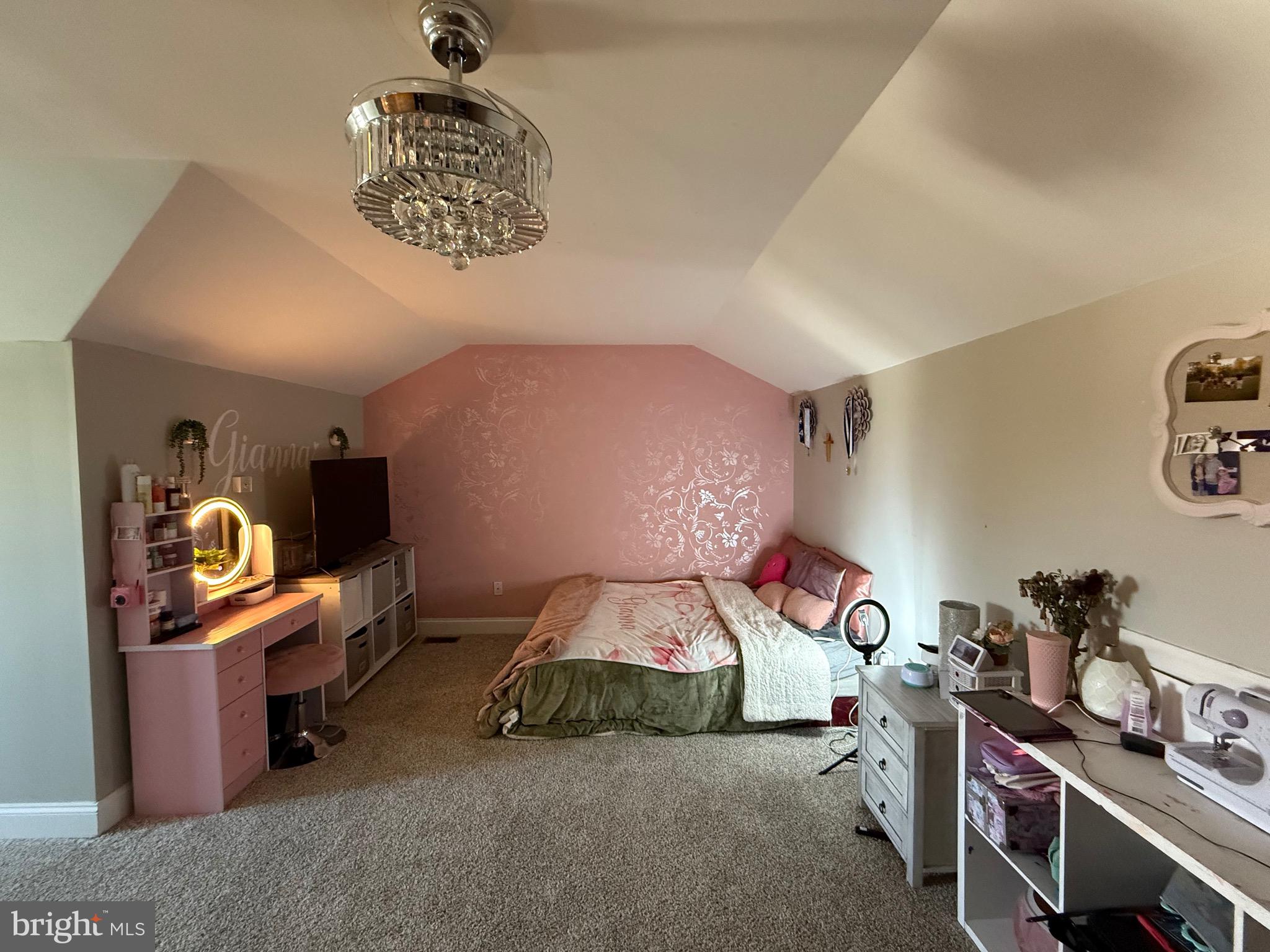 27 Bishop Pine Road Barto, PA 19504 - Photo 18 of 20 a bedroom with a bed and a chandelier