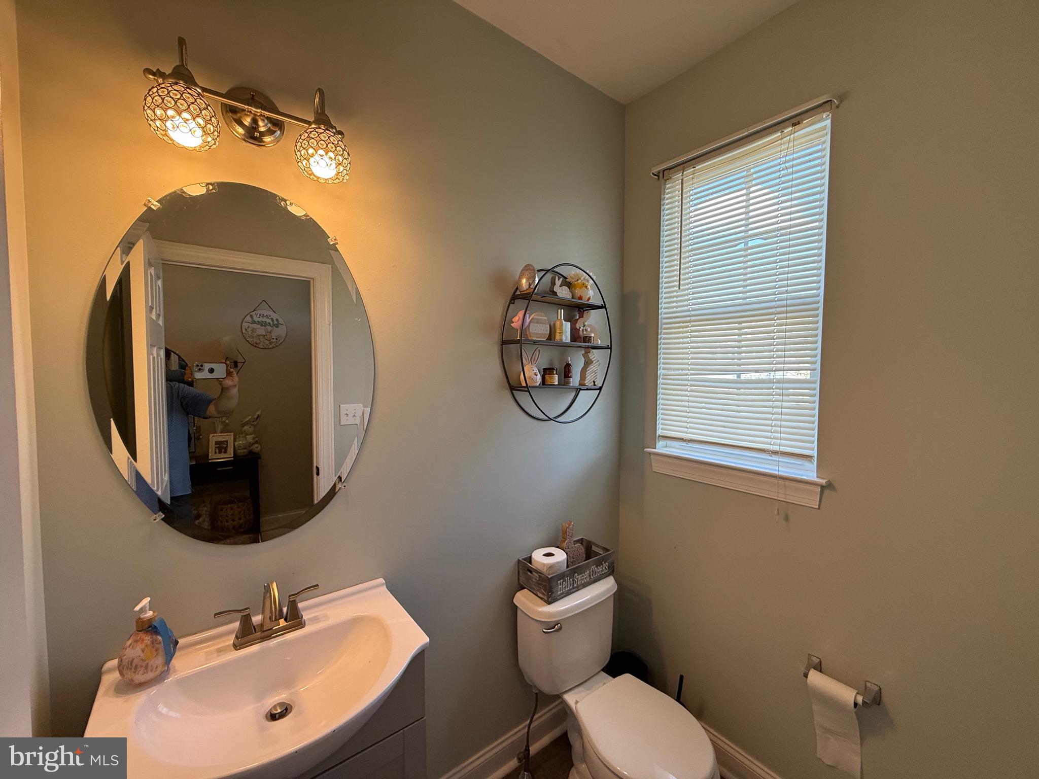 27 Bishop Pine Road Barto, PA 19504 - Photo 3 of 20 a bathroom with a toilet sink vanity and mirror