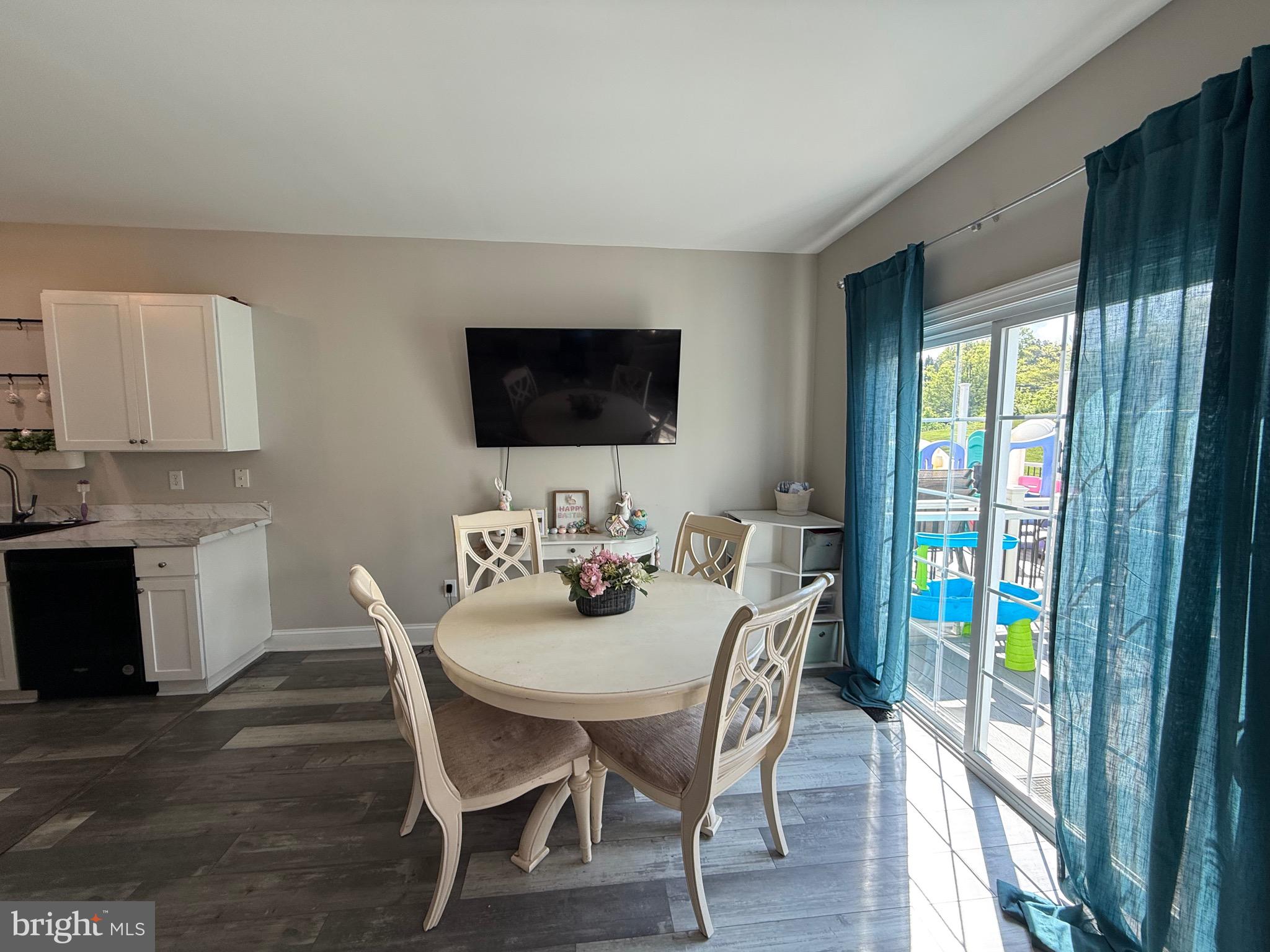 27 Bishop Pine Road Barto, PA 19504 - Photo 9 of 20 a view of a dining room with furniture window and wooden floor