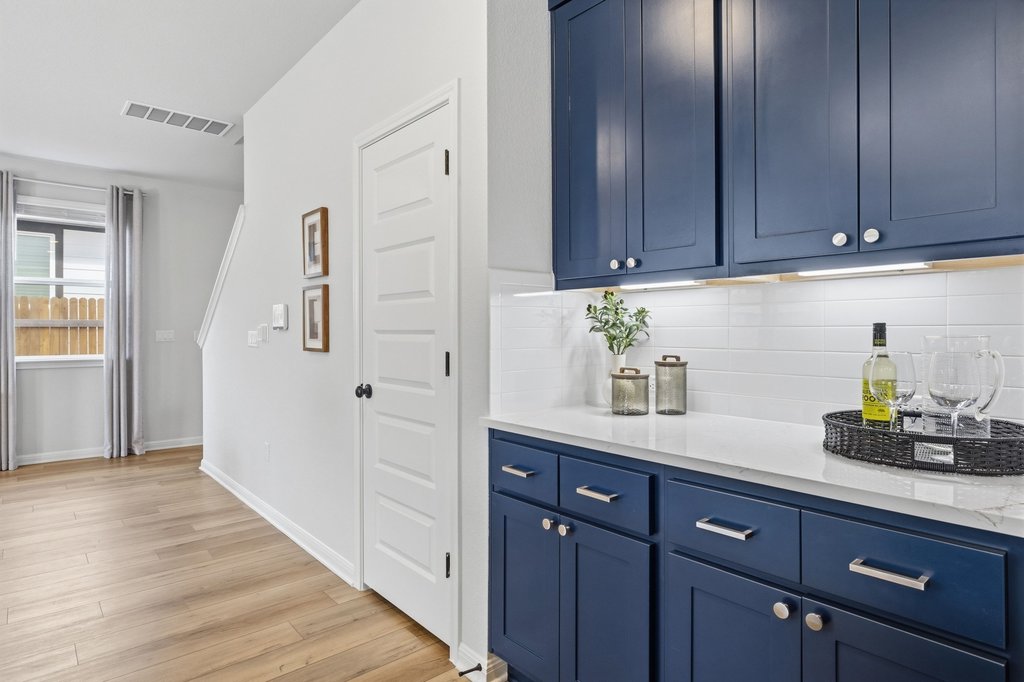 8001 Andravida Drive Austin, TX 78747 - Photo 31 of 35 Stylish dry bar with quartz countertops and ample storage