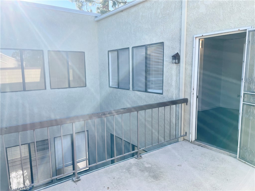 17 Grenache, Unit 72 Irvine, CA 92614 - Photo 19 of 20 a view of entryway with wooden floor