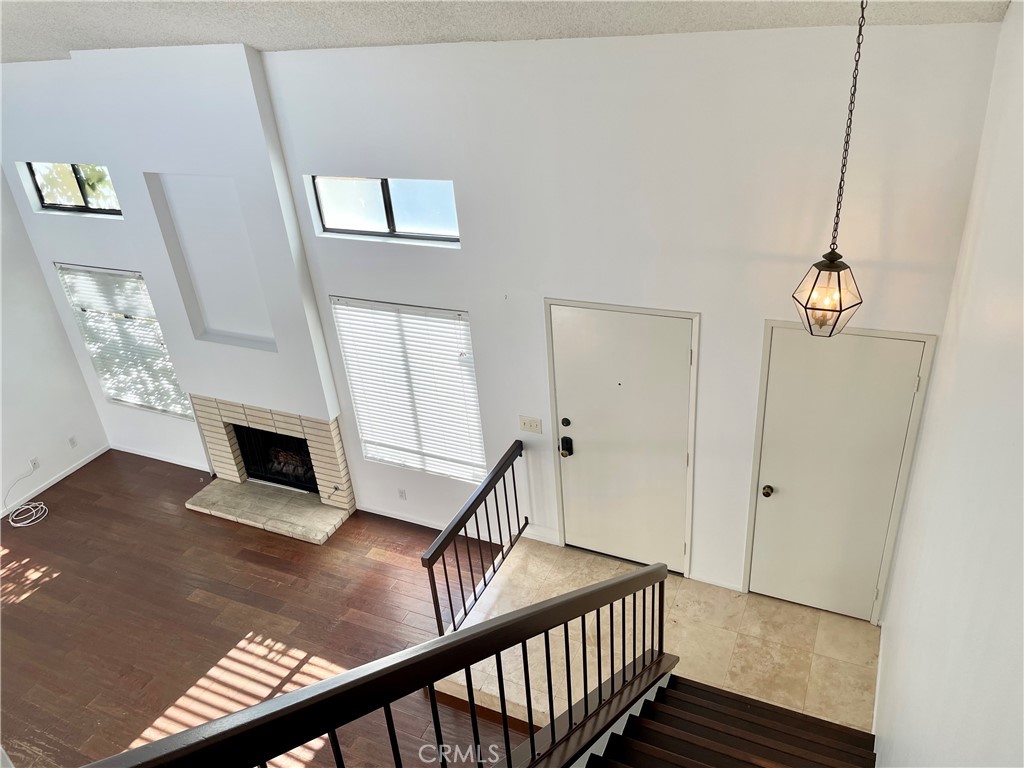 17 Grenache, Unit 72 Irvine, CA 92614 - Photo 6 of 20 a view of a livingroom with furniture and staircase