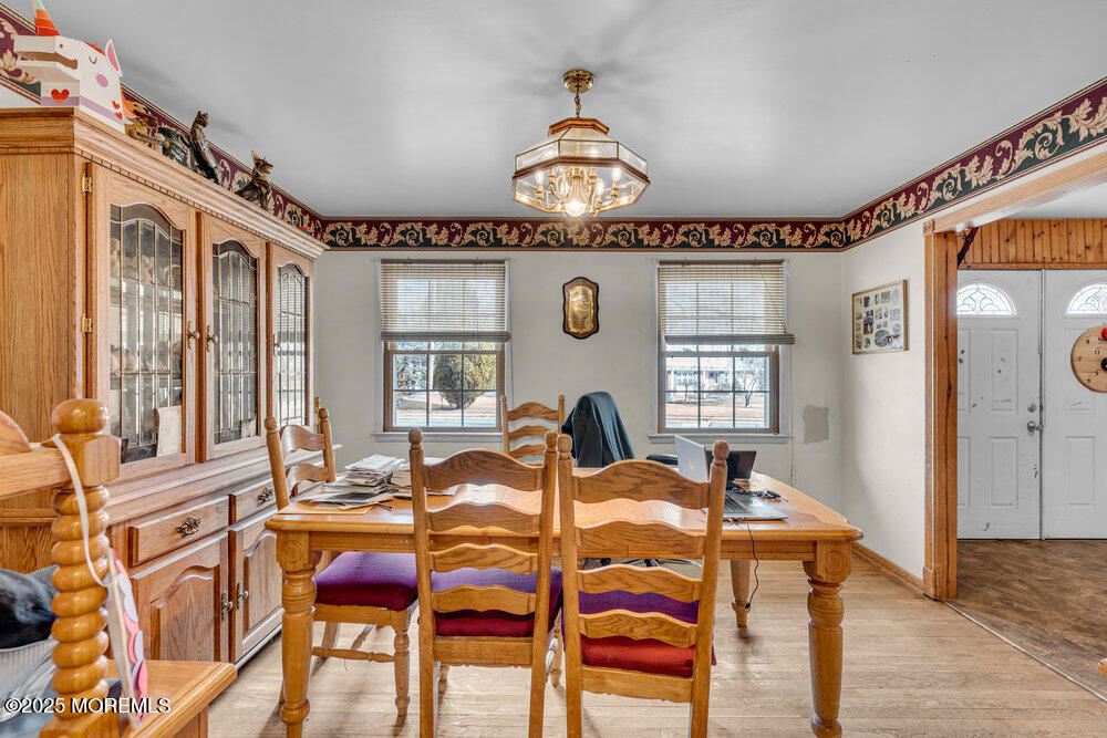 52 Newbury Road Howell, NJ 07731 - Photo 26 of 31 a view of a dining room with furniture window and wooden floor