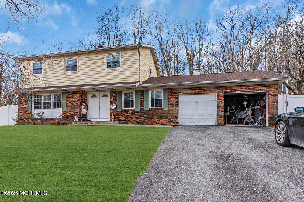 52 Newbury Road Howell, NJ 07731 - Photo 29 of 31 a view of a house with a yard and pathway
