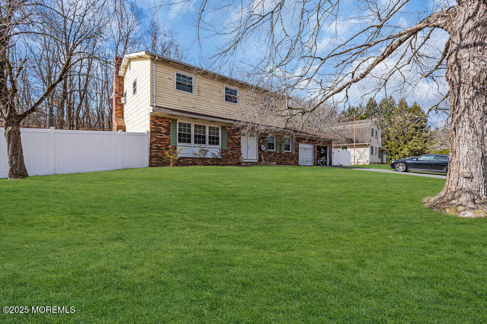 52 Newbury Road Howell, NJ 07731 - Photo 31 of 31 a view of a house with a yard
