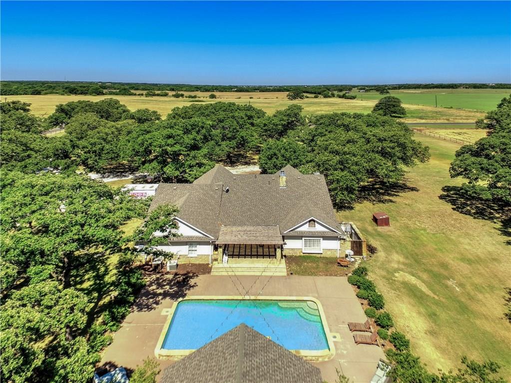 9366 Farm To Market Road 2931 Pilot Point, TX 76258 - Photo 1 of 1 a view of a city