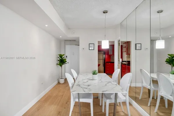 a view of a dining room with furniture