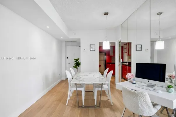 a view of a dining room with furniture