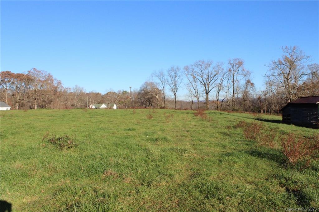 0 Calhoun Road Stony Point, NC 28678 - Photo 21 of 48 a view of grassy field with mountain in background