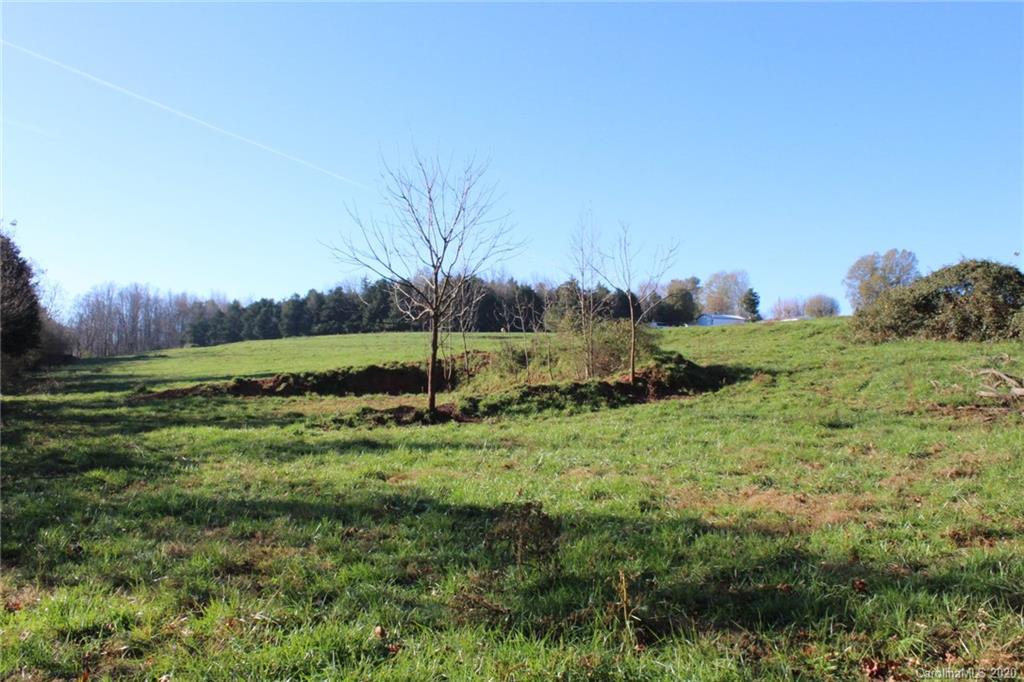 0 Calhoun Road Stony Point, NC 28678 - Photo 48 of 48 a view of a field of grass and trees