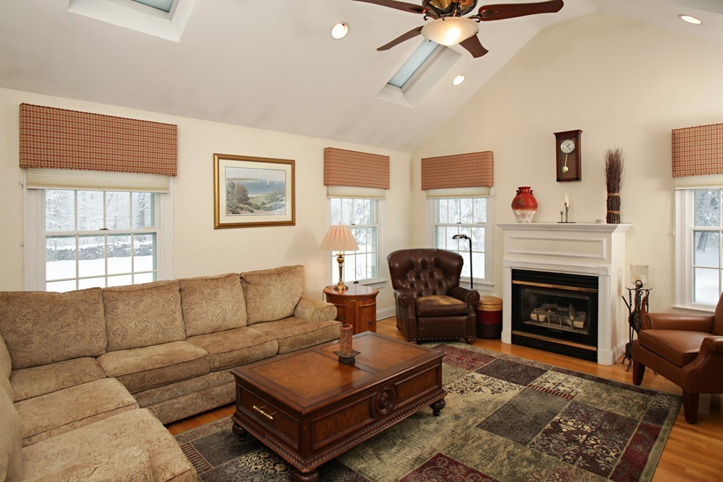 321 Concord Road Wayland, MA 01778 - Photo 4 of 12 a living room with furniture a window and a fireplace