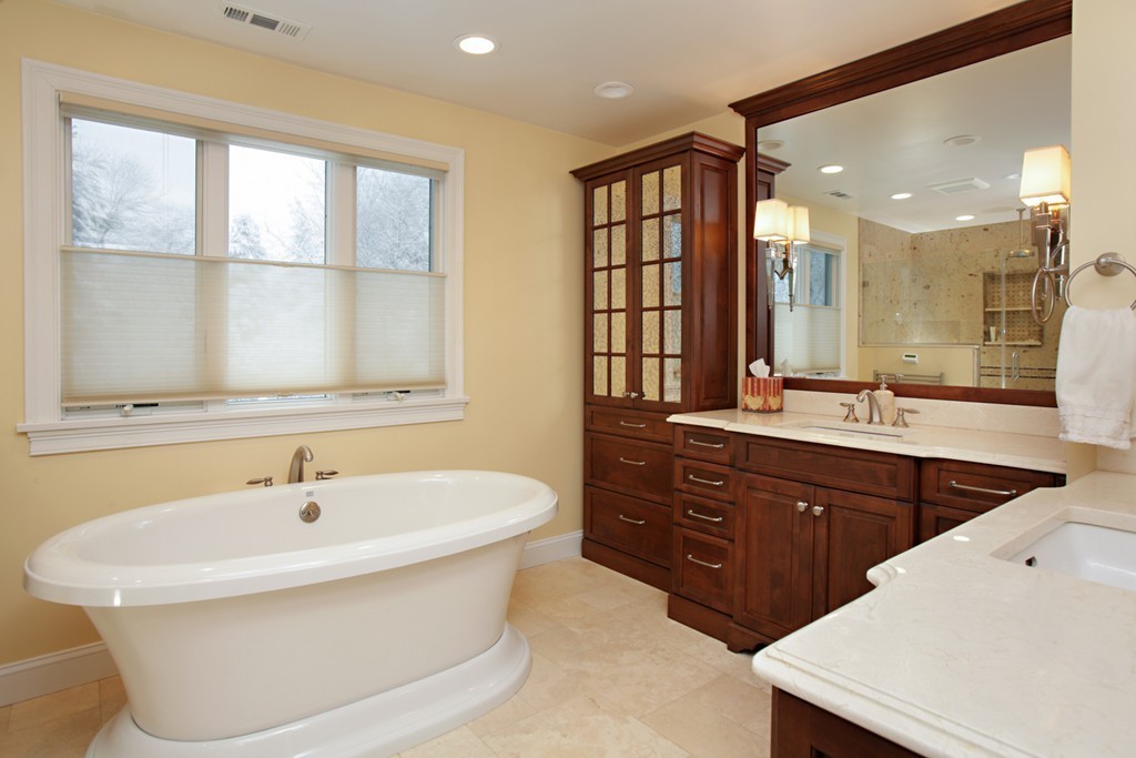321 Concord Road Wayland, MA 01778 - Photo 6 of 12 a bathroom with a sink and a mirror