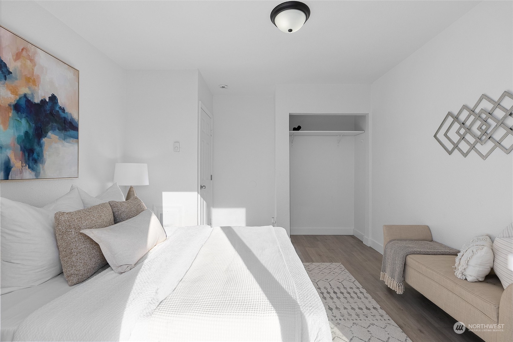 14915 Portland Avenue Southwest Lakewood, WA 98498 - Photo 16 of 24 a bedroom with a bed and a couch