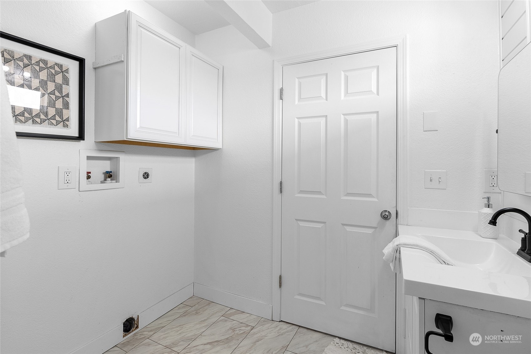 14915 Portland Avenue Southwest Lakewood, WA 98498 - Photo 22 of 24 a bathroom with a sink and a shower