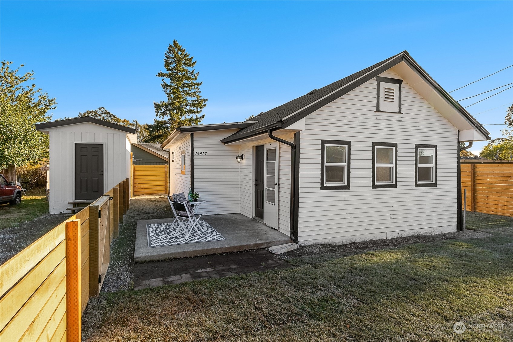 14915 Portland Avenue Southwest Lakewood, WA 98498 - Photo 23 of 24 a front view of a house with a yard