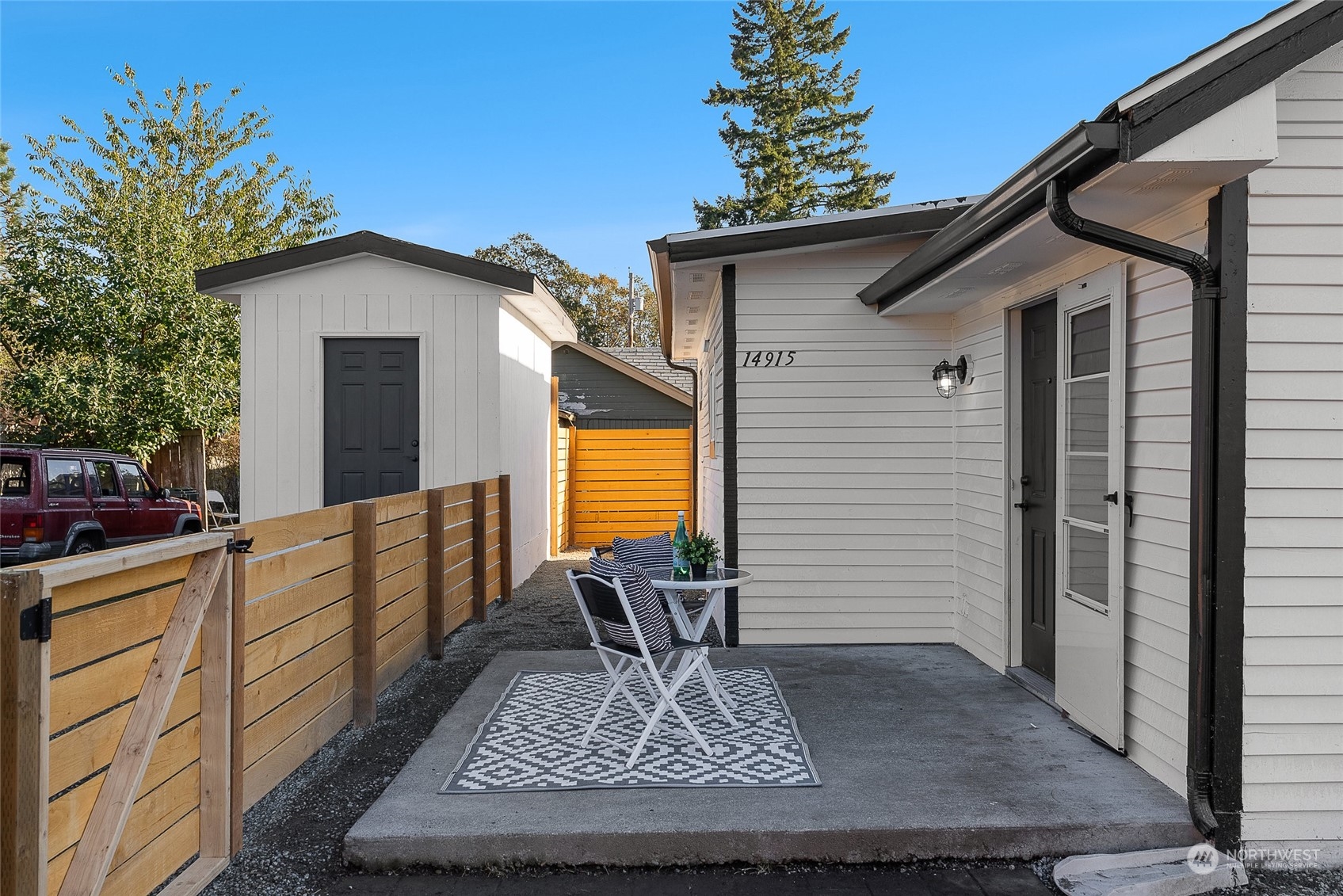 14915 Portland Avenue Southwest Lakewood, WA 98498 - Photo 24 of 24 a view of house with patio outdoor seating