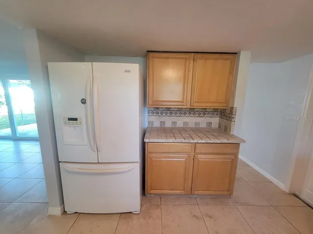 a bathroom with a sink a vanity and a mirror